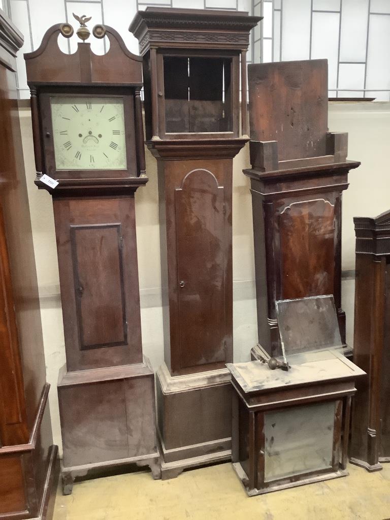 An early 19th century oak eight day longcase clock marked Harley & Son, Salop, together with two oak and mahogany clock cases